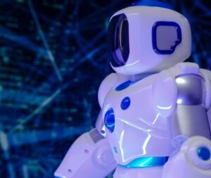 Close-up of a modern humanoid robot with glowing blue lights and futuristic design.